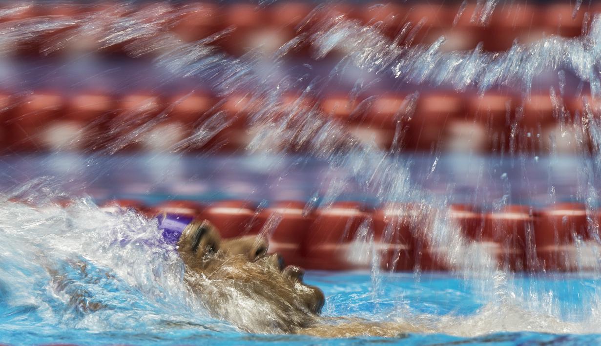 Perenang India, Jadhav Suyash, beradu cepat pada nomor 200 meter gaya ganti Asian Para Games di Stadion Aquatic Senayan, Jakarta, Minggu (7/10/2018). (Bola.com/Vitalis Yogi Trisna)