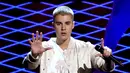 Dikagumi banyak orang, seorang selebriti harusnya senang dan bersikap ramah dengan penggemarnya. Hal ini sepertinya tak terjadi dengan Justin Bieber saat disapa fansnya, ‘Belibers’. (AFP/Bintang.com)