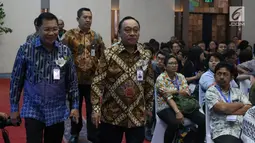 Direktur Utama PT Bank Tabungan Negara (Persero) Tbk. Maryono dan Komisaris utama, Asmawi Syam tiba menghadiri Rapat Umum Pemegang Saham Luar Biasa (RUPSLB) di Menara Bank BTN, Jakarta, Kamis (29/8/2019).  (Liputan6.com/Angga Yuniar)