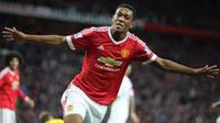 TAK TERBEBANI - Penyerang Manchester United, Anthony Martial, mengaku tak terbebani bandrol harganya. (Guardian)