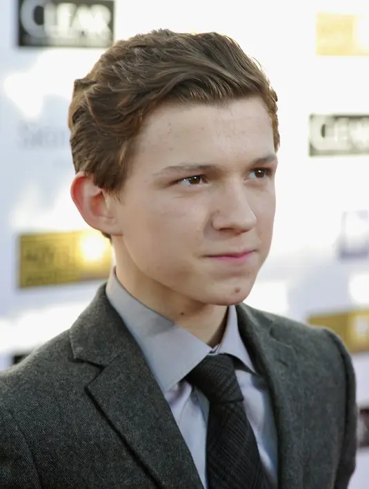 Aktor asal Inggris ini memulai debutnya sebagai Peter Parker dan ‘alter ego’nya sebagai Spider-Man pada tahun depan. Para penggemar masih harus menunggu untuk melihat aksi Tom berayun-ayun di jarring laba-laba. (AFP/Bintang.com)