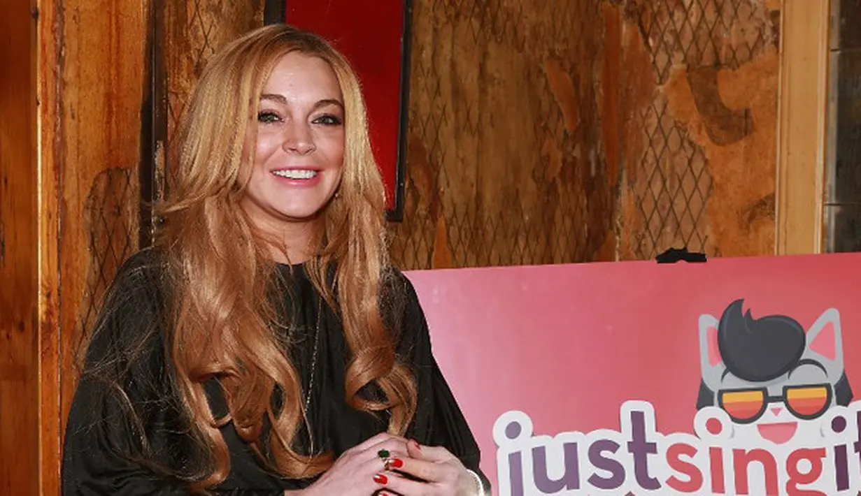 Bukan hal yang baru ketika Lindsay Lohan hadir dengan kabar yang menandakan dirinya sebagai seorang mualaf. Sempat muncul pemberitaan Lindsay sedang difoto sambil membawa Al-Quran pada beberapa waktu silam. (AFP/Bintang.com)