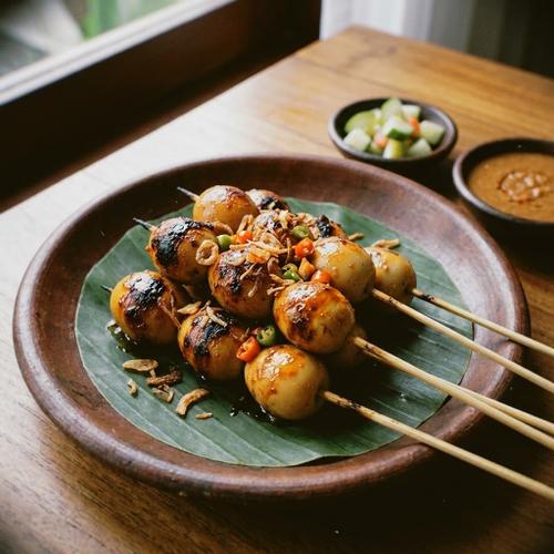 Ilustrasi Kreasi Telur Puyuh Jadi Sate/Gemini AI