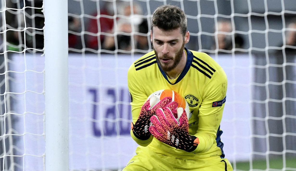 De Gea kembali dipercaya oleh Solskjaer menjadi starter saat melawan AS Roma di dini hari tadi. Sang kiper bisa dikatakan menjadi pahlawan Manchester United di laga itu. (Foto: AFP/Filippo Monteforte)