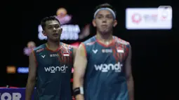 Ganda putra Indonesia Fajar Alfian/Muhammad Rian Ardianto usai bertanding di babak semifinal Kapal Api Indonesia Open 2025 melawan Kim Won Ho/Seo Seung Jae (Korea Selatan) di Istora Gelora Bung Karno, Senayan, Jakarta, Sabtu (7/6/2025). (Liputan6.com/Helmi Fithriansyah)