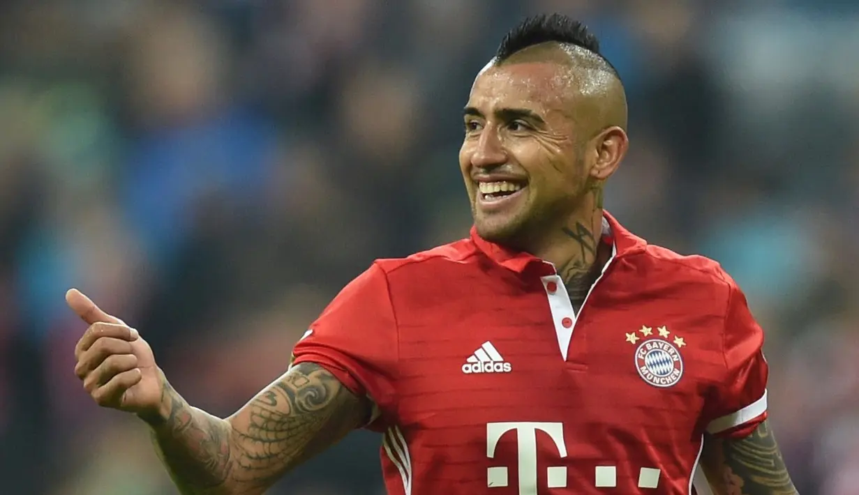 Bayern Munchen menang 2-0 atas Borussia Monchengladbach dalam laga pekan ke-8 Bundesliga 2016-2017, Sabtu (23/10/2016). Gol kemenangan dicetak Arturo Vidal dan Douglas Costa. (AFP/Christof Stache)