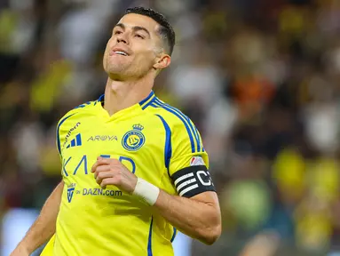 Dua golnya pada laga Al Nassr vs Damac membuat megabintang asal Portugal ini telah meraih 915 gol sepanjang kariernya dan tinggal sedikit lagi untuk mencapai angka 1.000 gol. (AFP/Fayez Nureldine)