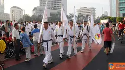 Citizen6, jakrta: HUT ke-40 Institut Karate-Do Indonesia (INKAI) Gashuku Akbar Nasional di Bunderan Hotel Indonesia Jakarta, Minggu (17/4).(Pengirim: Badarudin Bakri Badar)