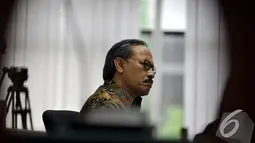 Heru dituntut hukuman 10 tahun penjara dan denda Rp 600 juta subsidair 6 bulan kurungan. Foto diambil pada Senin (1/12/2014). (Liputan6.com/Miftahul Hayat)