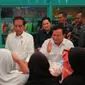 Presiden Joko Widodo (Jokowi) blusukan ke Pasar Bululawang, Kecamatan Bululawang, Kabupaten Malang, Jawa Timur. Kali ini Jokowi ditemani Prabowo Subianto dan Erick Thohir.