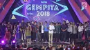 Wakil Gubernur DKI Jakarta, Sandiaga Uno membaca pantun saat konser Gempita 2018 di pantai karnaval Ancol, Jakarta, Senin (1/1). (Liputan6.com/Herman Zakharia)