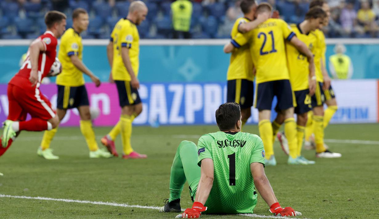 Dalam tiga laga yang dijalani, Polandia kebobolan enam gol alias rata-rata kemasukan dua gol per pertandingan. Szczesny sendiri hanya menghadapi 11 tembakan tepat sasaran dalam tiga laga tersebut. (Foto: AP/Pool/Anatoly Maltsev)