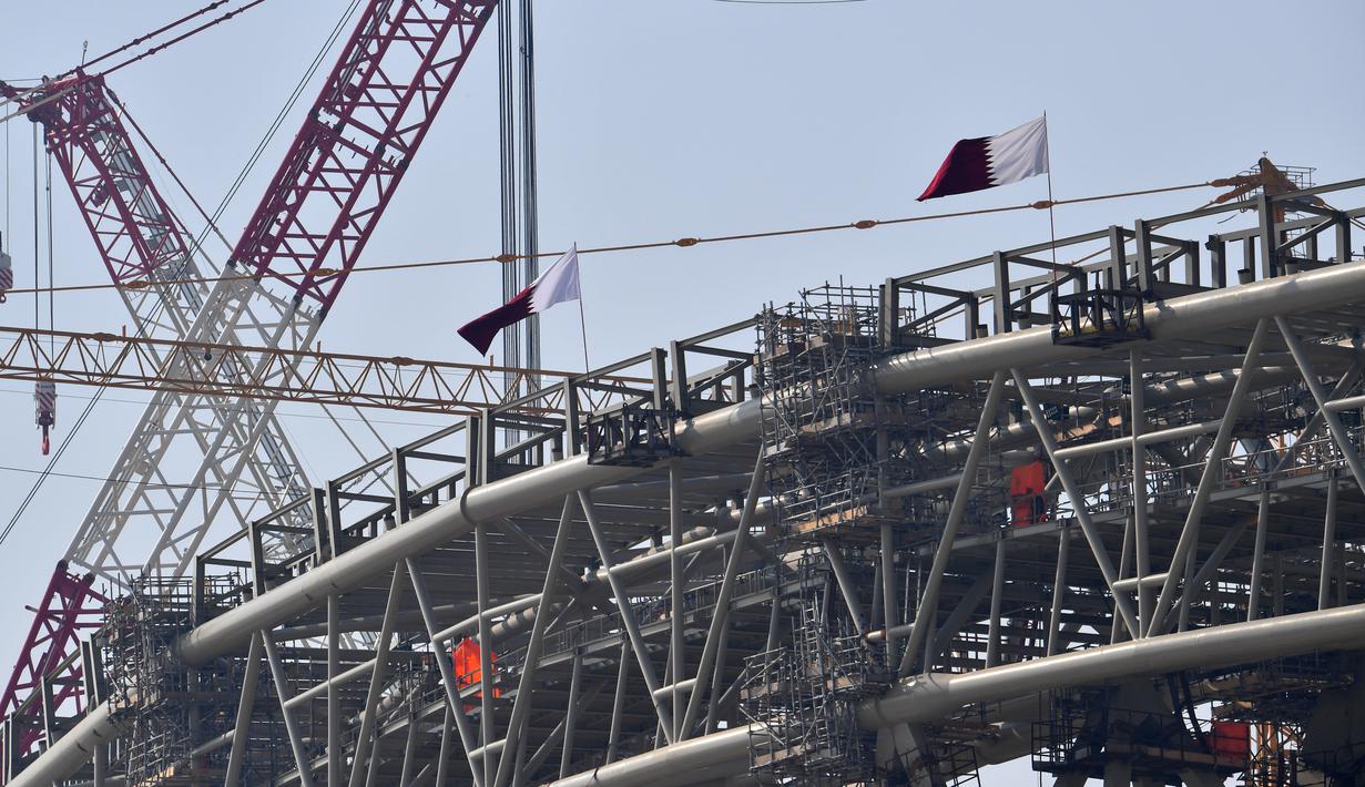 Suasana pembangunan Stadion Lusail di Qatar, Jumat (20/12). Lusail akan menjadi stadion untyuk partai pembuka dan penutup piala dunia 2022 di Qatar. (AFP/Giuseppe Cacace)