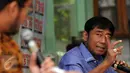 Wakil Ketua DPRD DKI Jakarta, Abraham Lunggana (kanan) saat mengikuti diskusi Mencari Sumber yang Waras di Jakarta, Sabtu (18/6). Diskusi juga dihadiri ahli hukum TemanAhok dan Wakil Ketua DPR, Fadli Zon. (Liputan6.com/Helmi Fithriansyah)