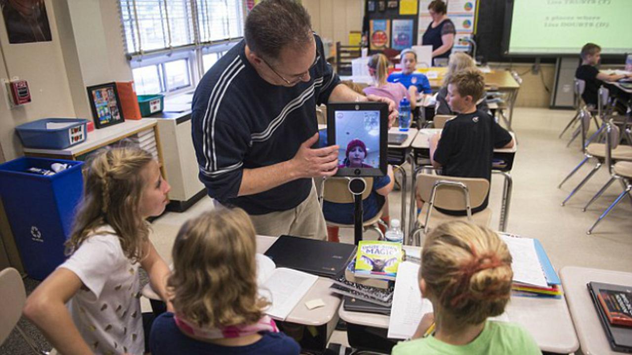 Robot Ini 'Hadirkan' Pelajar di Sekolah