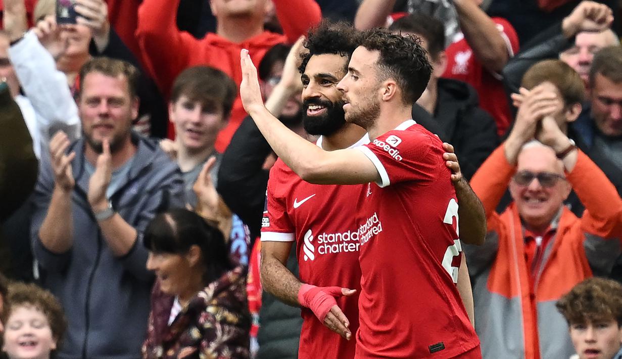 Kepergian Mohamed Salah tentu akan menjadi cerita sedih bagi para pendukung Liverpool. Meskipun begitu, Salah akan tetap dikenang sebagai legenda abadi di Anfield. (AFP/Paul Ellis)