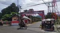 Gerbang kampung merah putih Desa Bongoime, Kecamatan Tilongkabila (Arfandi Ibrahim/Liputan6.com)