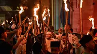 Kemeriahan Pawai Obor Sambut Idul Fitri 1446 Hijriah di Surabaya