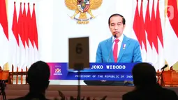 Presiden Joko Widodo memberi sambutan secara virtual pada 
diskusi informal Forum B20 yang diikuti delegasi anggota G20, di Jakarta, Kamis (27/1/2022). Untuk menggenjot pertumbuhan ekonomi dunia diperlukan prinsip keberlanjutan lingkungan guna mencegah pemanasan global. (Liputan6.com/HO/Alwi)