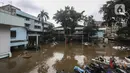 Suasana banjir di kawasan Tendean Jakarta, Sabtu (20/2/2021). Curah hujan yang tinggi menyebabkan banjir setinggi orang dewasa di kawasan Tendean. (Liputan6.com/Johan Tallo)