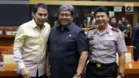 Ketua Komisi III DPR Azis Syamsuddin (kiri) foto bersama Wakapolri Komjen Ari Dono (kanan) dan Wakil Jaksa Agung Arminsyah sebelum rapat kerja di Kompleks Parlemen, Senayan, Jakarta, Senin (17/6/2019). Rapat membahas anggaran untuk Polri dan Kejaksaan Agung pada 2020. (Liputan6.com/JohanTallo)