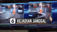 Terekam kamera cctv kejadian janggal terjadi di dalam parkiran mobil.
