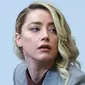 Aktris Amber Heard tiba di Fairfax County Circuit Courthouse, Fairfax, Virginia, Amerika Serikat, 26 Mei 2022. "Orang Yunani menemukan bahwa rasio ada di mana-mana di alam dan selama ribuan tahun telah dianggap memegang formula rahasia wajah paling cantik di dunia," kata Dr Julian De Silva dari Harley Street. (Michael REYNOLDS/POOL/AFP)