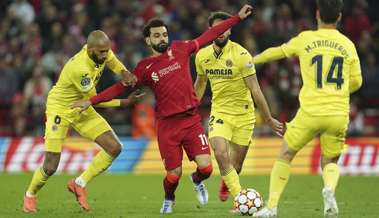 <p>Rapatnya barisan pertahanan Villarreal membuat para pemain Liverpool kesulitan untuk menembusnya. The Reds pun dibuat cukup frustrasi akan situasi tersebut. (AP/Jon Super)</p>