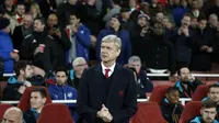 Manajer Arsenal, Arsene Wenger, mengaku terkesan dengan penampilan timnya saat mengalahkan Dinamo Zagreb dengan skor 3-0, Rabu (25/11/2015) dini hari WIB. (AFP/ADRIAN DENNIS)