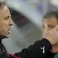 Gaya pelatih Ghana Milovan Rajevac di laga penyisihan Grup D melawan Jerman di Soccer City Stadium, Johannesburg, 23 Juni 2010. AFP PHOTO / PEDRO UGARTE / GIANLUIGI GUERCIA 