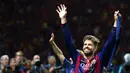 Bek Barcelona, Gerard Pique, melakukan selebrasi setelah mengalahkan Juventus pada laga final liga Champions di Stadion Olyimpic, Berlin, Jerman (6/6/2015). Sebelum kembali ke Barcelona, Pique memperkuat Manchester United. (EPA/Federico Gambarini)