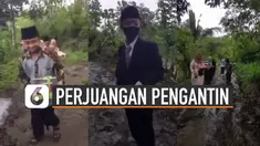 Terlihat pengantin pria dan rombongan keluarga berbondong-bondong melewati jalanan yang becek dan tanpa aspal.