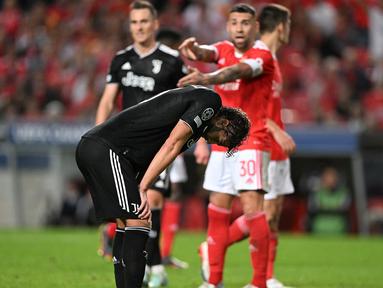 Salah satu tim unggulan di Liga Champions musim 2022/2023, Juventus harus angkat koper lebih awal dari persaingan kompetisi kasta tertinggi di Benua Biru. Mereka harus tersingkir di fase grup usai kalah 3-4 dari tuan rumah Benfica pada matchday ke-5 Grup H, Rabu (26/10/2022) dini hari WIB. (AFP/Patricia De Melo Moreira)