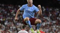 Ekspresi kegembiraan striker Manchester City, Erling Haaland, saat laga kontra Sevilla pada matchday pertama Grup G Liga Champions 2022/2023 di Stadion Ramon Sanchez Pizjuan, Rabu (7/9/2022) dini hari WIB. (Cristina Quicler/AFP)