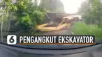 Detik-detik kecelakaan sebuah truk pengangkut ekskavator terekam kamera dashboard mobil.