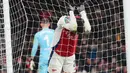 Pemain Arsenal, Kai Haverts, terlihat kecewa setelah ditaklukkan Newcastle United dalam laga leg pertama semifinal Carabao Cup 2024/2025 yang digelar di Emirates Stadium, Rabu (8/1/2025) dini hari WIB. (AP Photo/Kirsty Wigglesworth)