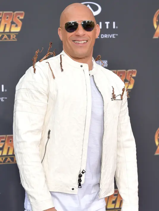 Aktor Vin Diesel tersenyum saat menghadiri pemutaran perdana film Disney dan Marvel 'Avengers: Infinity War' di Los Angeles, California (23/4). Vin Diesel merupakan pemeran Groot dalam film ketiga The Avengers ini. (AFP Photo/Neilson Barnard)