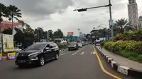 Arus lalu lintas kendaraan menuju kawasan Puncak, Bogor, Jawa Barat, mengalami peningkatan volume sejak hari pertama libur Lebaran (Liputan6.com/Achmad Sudarno)
