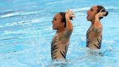 Perenang Artistik Indonesia Andriani Shintya Ardhana dan Naima Syeeda Sharita tampil pada final Renang Artistik Ganda Putri nomor Duet Technical Routine Asian Games 2018 di Aquatic Centre GBK, Jakarta, Senin (27/8). (ANTARA FOTO/INASGOC/Hendy Akbar)