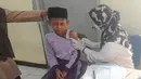 Bulan Imunisasi Anak Sekolah (BIAS) bertujuan memperpanjang antibodi atau kekebalan, terutama terhadap penyakit difteri, tetanus, campak, dan rubella. (merdeka.com/Arie Basuki)