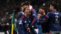 Selebrasi bek Arsenal Gabriel usia timnya mengalahkan Sporting di Leg 1 Perempat Final Liga Champions 2025/2026. (PATRICIA DE MELO MOREIRA / AFP)