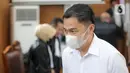 Terdakwa kasus merintangi penyidikan atau 'obstruction of justice' pembunuhan berencana terhadap Brigadir J, Arif Rachman Arifin usai sidang pembacaan putusan sela di Pengadilan Negeri Jakarta Selatan, Selasa (1/11/2022). Dalam dakwaan sebelumnya, Mantan Wakaden B Biro Paminal Divisi Propam Polri AKBP Arif Rachman berperan merusak alat bukti laptop yang berisi data rekaman CCTV.. (Liputan6.com/Faizal Fanani)
