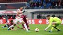 Dia adalah Christopher Nkunku dari RB Leipzig. Pemain jebolan akademi PSG itu tidak hanya tajam di depan gawang lawan namun juga piawai memberikan umpan kepada rekannya. (AFP/ Ronny Hartmann)