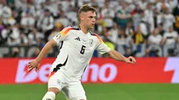 Joshua Kimmich telah memperkuat Timnas Jerman sejak tahun 2015. Sebagai pemain reguler di Bayern dan Der Panzer, Kimmich memiliki harga pasar yang cukup lumayan. Nilainya mencapai angka 50 juta euro. (AFP/Miguel Medina)