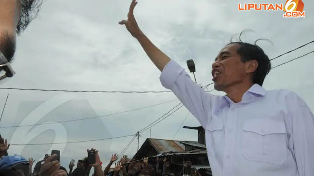 [FOTO] Ekspresi Jokowi dan Warga Papua di Pasar Yotefa