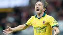 Pemain AC Milan, Luka Modric, melakukan selebrasi setelah mencetak gol ke gawang Bologna dalam giornata ketiga Liga Italia 2025/2026 di Stadion San Siro, Senin (15/9/2025). (AP Photo/Luca Bruno)