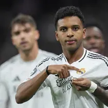 Selebrasi Rodrygo dalam laga Liga Champions antara Real Madrid vs Atletico Madrid, Rabu (5/3/2025). (c) AP Photo/Manu Fernandez