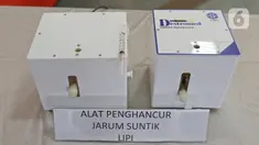 Wujud alat penghancur jarum suntik buatan Lembaga Ilmu Pengetahuan Indonesia (LIPI) saat uji coba APJS di Gedung LIPI, Jakarta, Kamis  (18/3/2021). Alat tersebut mampu menghancurkan 5.000 jarum suntik per unit. (Liputan6.com/Herman Zakharia)