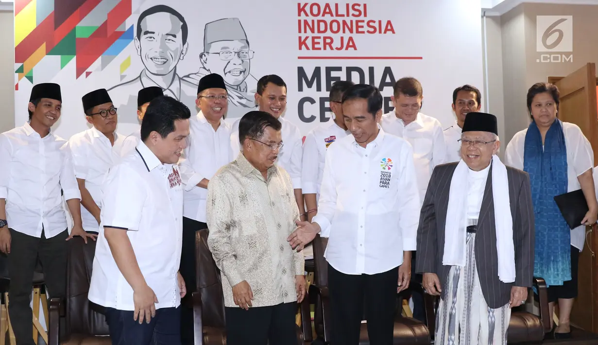 Calon Presiden petahana, Joko Widodo (kedua kanan depan) bersama Ketua Dewan Pengarah Tim Kampanye, Jusuf Kalla (kedua kiri depan) dan Ketua Tim Kampanye Nasional, Erick Thohir usai penetapan di Jakarta, Jumat (7/9). (Liputan6.com/Helmi Fithriansyah)