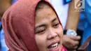 Siti Aisyah memberi keterangan di Bandara Halim Perdanakusuma, Jakarta, Senin (11/3). Siti Aisyah kembali ke Indonesia setelah dibebaskan Pengadilan Tinggi Shah Alam terkait kasus dugaan pembunuhan Kim Jong-Nam. (Liputan6.com/Faizal Fanani)